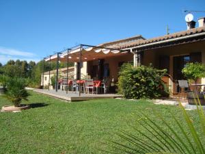 Zahrada ubytování Chambres d'hôtes Les Palmiers de la Cité