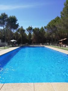 Bazén v ubytování casas rurales la lagunilla nebo v jeho okolí