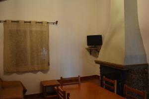 TV a/nebo společenská místnost v ubytování casas rurales la lagunilla