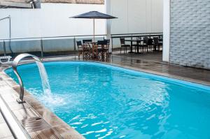 Swimming pool sa o malapit sa Hotel Portinari Ponte da Amizade
