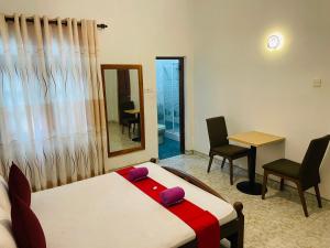 Postel nebo postele na pokoji v ubytování Ivana Homestay