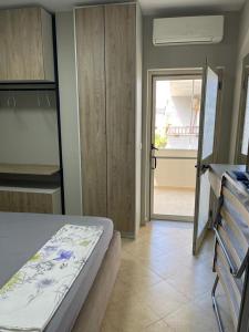 Кровать или кровати в номере Apartment in Durres beach