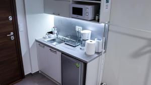 A kitchen or kitchenette at Studio City Center
