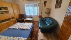 A bed or beds in a room at Holiday home in Siofok - Balaton 38173