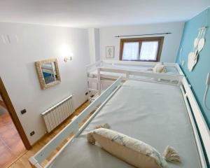 Postel nebo postele na pokoji v ubytování Casa Jonico