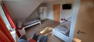 TV a/nebo společenská místnost v ubytování Ferienwohnung Rita
