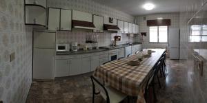 Kuchyň nebo kuchyňský kout v ubytování Vivienda familiar en la Ría de Vigo