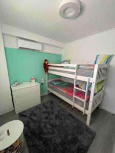 Posteľ alebo postele v izbe v ubytovaní Ferienwohnung Miramar V
