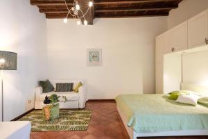 Posteľ alebo postele v izbe v ubytovaní Navona Square House