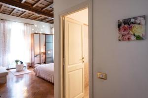 Posteľ alebo postele v izbe v ubytovaní Navona Square House