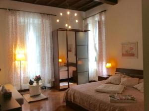 Posteľ alebo postele v izbe v ubytovaní Navona Square House