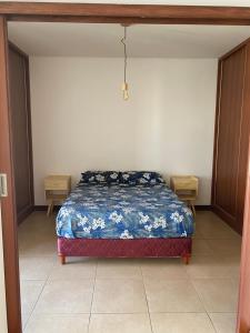 Una cama o camas en una habitación de Malbec San Juan