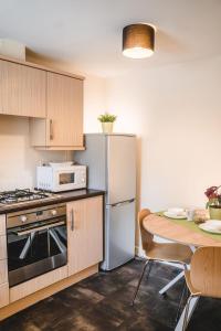 Køkken eller tekøkken på Snapos Apartments - Tudor Close