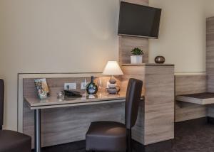 TV a/nebo společenská místnost v ubytování Hotel Sonnengarten
