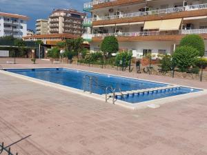The swimming pool at or close to BRAVAHOLIDAYS-260-Lotus-2