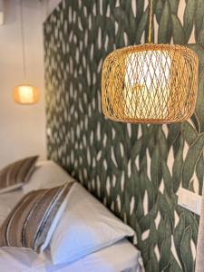 Postel nebo postele na pokoji v ubytování NEW! -Verderame Rooms & Suite in Lucca
