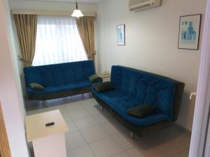 A seating area at Paradise Apart Hotel