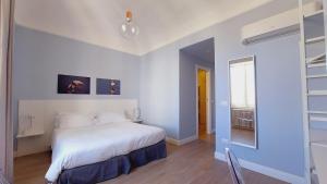 Postel nebo postele na pokoji v ubytování D-Home Ortigia