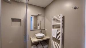 Ett badrum på D-Home Ortigia