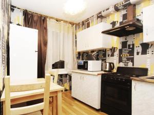 Kjøkken eller kjøkkenkrok på ApartLux Kuzminki