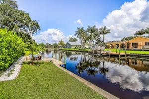a view of a river with buildings and trees at Smiles and Sunshine in Cape Coral