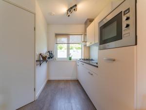 Kuchyň nebo kuchyňský kout v ubytování Tiny house Koolmees