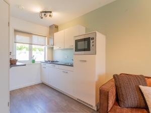 Kuchyň nebo kuchyňský kout v ubytování Tiny house Koolmees