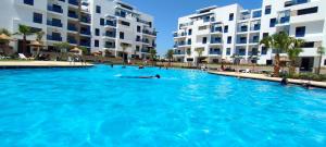 Bazén v ubytování Appartement costa mar martil nebo v jeho okolí