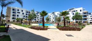 Bazén v ubytování Appartement costa mar martil nebo v jeho okolí