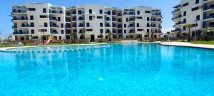 Bazén v ubytování Appartement costa mar martil nebo v jeho okolí