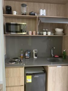 Una cocina o zona de cocina en Modern studio, Poblado, coworking, A/C, Gym 1411
