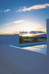 The sunrise or sunset as seen from A villát or nearby