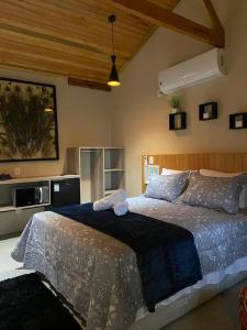 Cama ou camas em um quarto em Pousada Maibe Amanhecer na Serra