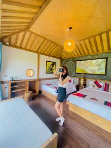 Postel nebo postele na pokoji v ubytování Sin Chai Ecolodge