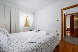 Postel nebo postele na pokoji v ubytování Apartment Paradiz