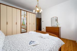 Postel nebo postele na pokoji v ubytování Apartment Paradiz