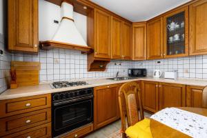 Kuchyň nebo kuchyňský kout v ubytování Apartment Paradiz