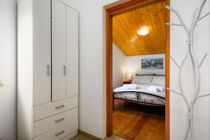 Postel nebo postele na pokoji v ubytování Apartment Paradiz