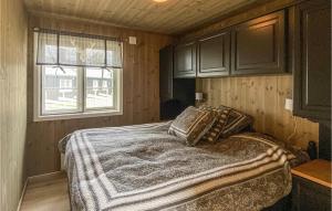 Postel nebo postele na pokoji v ubytování 4 Bedroom Nice Home In Tisleidalen
