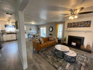 a living room with a couch and a fireplace at Sunrise Experience w/King Size Bed & Pet Friendly in Roswell