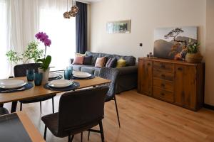 Posedenie v ubytovaní Praktyczny apartament z cichym tarasem