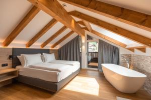 Ліжко або ліжка в номері Am Brunnen Apartments