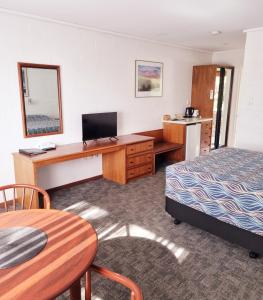 Un pat sau paturi într-o cameră la Bremer Bay Resort