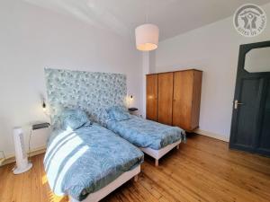 Säng eller sängar i ett rum på Appartement Cambrai, 4 pièces, 6 personnes - FR-1-510-178