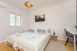 Postel nebo postele na pokoji v ubytování LUXURY VILLA AENONA + 37 fotografií