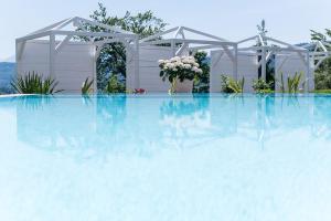 Bazén v ubytovaní das Balance - Spa & Golf Hotel am Wörthersee alebo v jeho blízkosti