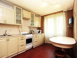 Kuchyň nebo kuchyňský kout v ubytování ApartLux Taganskaya Suite