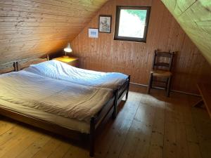 En eller flere senge i et værelse på Architect`s Cottage - serenity and greenery in the highlands