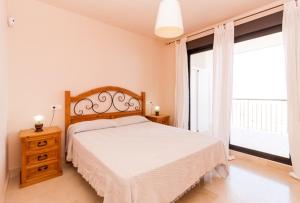 Postel nebo postele na pokoji v ubytování Apartamento Vistamar Calaceite con vistas al Mar