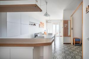 A kitchen or kitchenette at Playa Grande 504 - Immobiliare Living